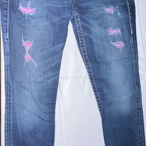 True Religion purple bar tacks and 1/2 inch stitches